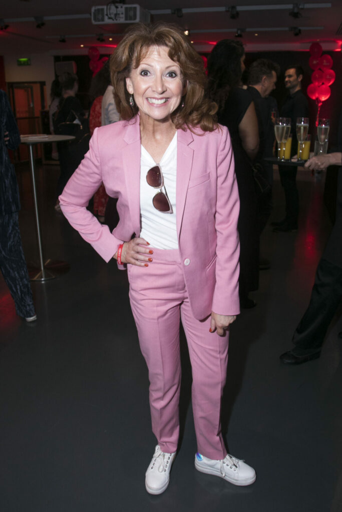 Bonnie Langford wearing a pink trouser suit