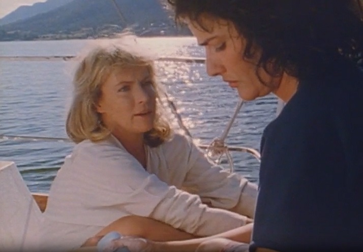 Two women talking on a boat