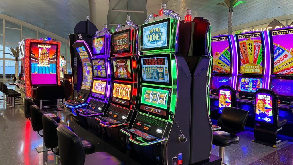 empty chairs in front of arcade machines