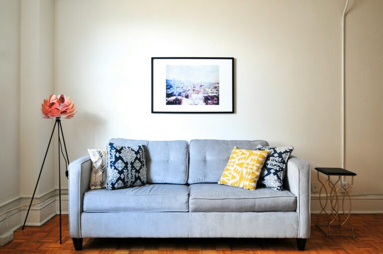 Stock image of a living room with a sofa in the centre