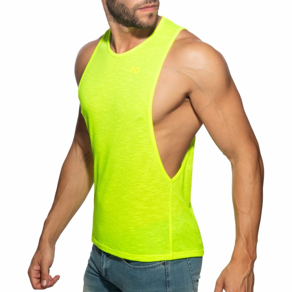 Male model wearing a green tank top