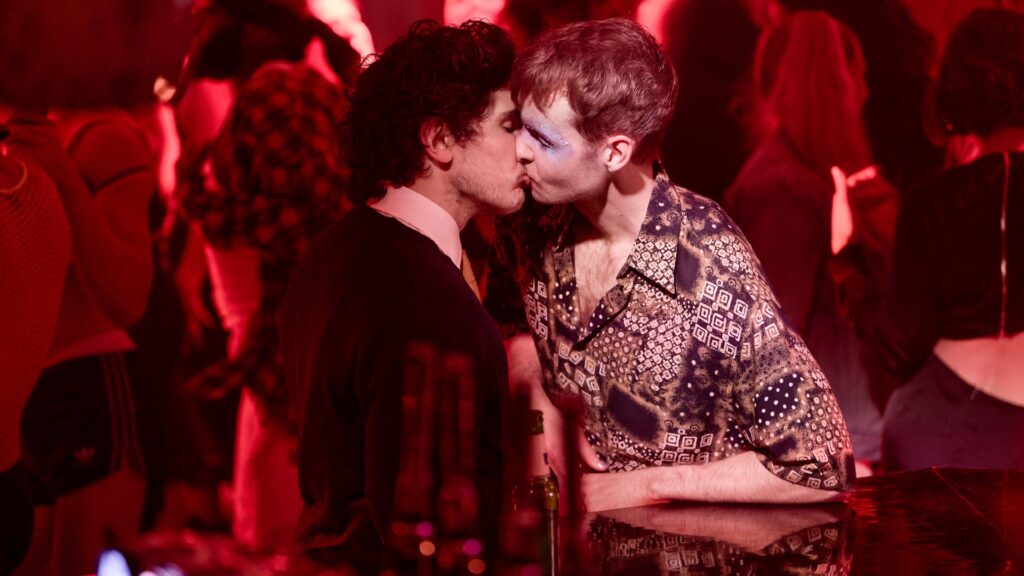 Two actors from Lost Boys and Fairies kissing