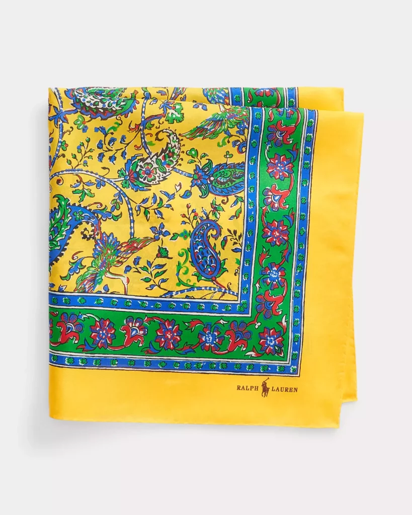 A yellow green and blue paisley scarf