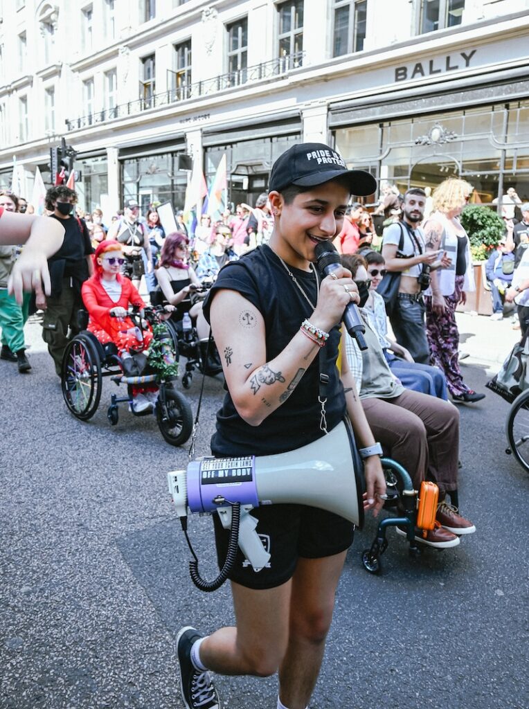 Media figure Shivani Dave addresses the crowd during the march