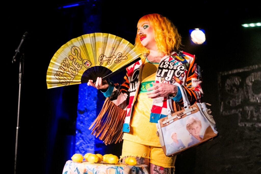 Ginny Lemon performing onstage