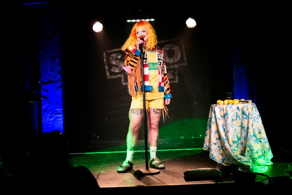 Ginny Lemon performing onstage