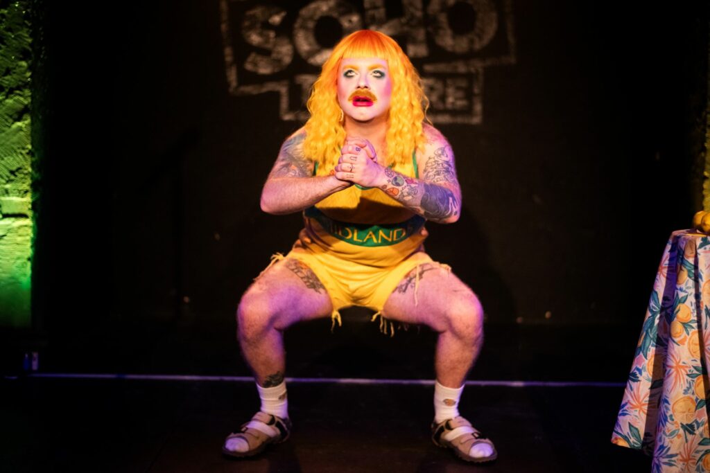 Ginny Lemon performing onstage