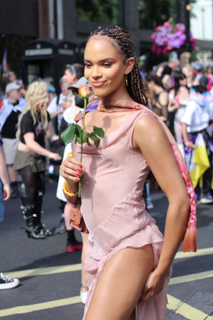 Yasmin finney holding a rose