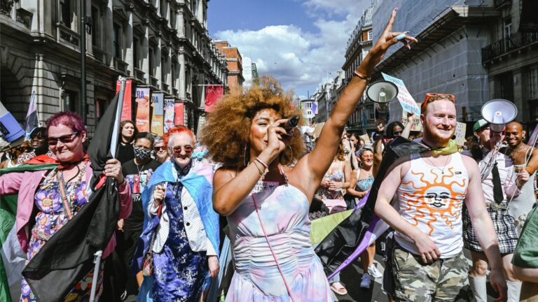 People marching in London Trans+ Pride