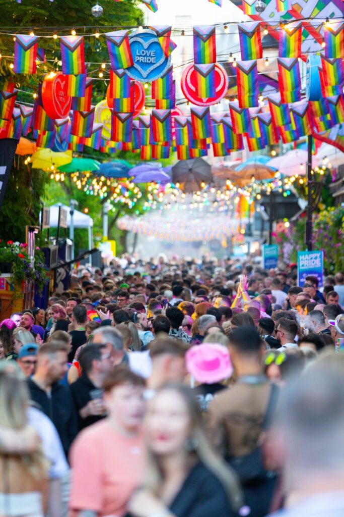 Pride decorations and crowds on Canal Street