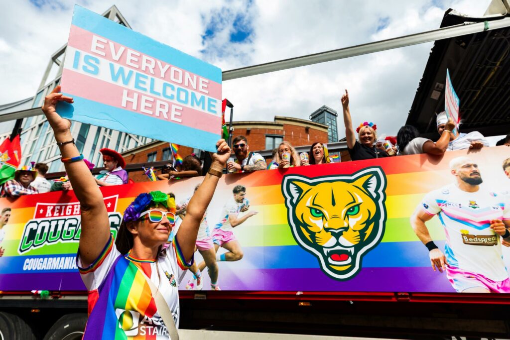 A colourful float in Manchester Pride featuring the Keighley Cougars