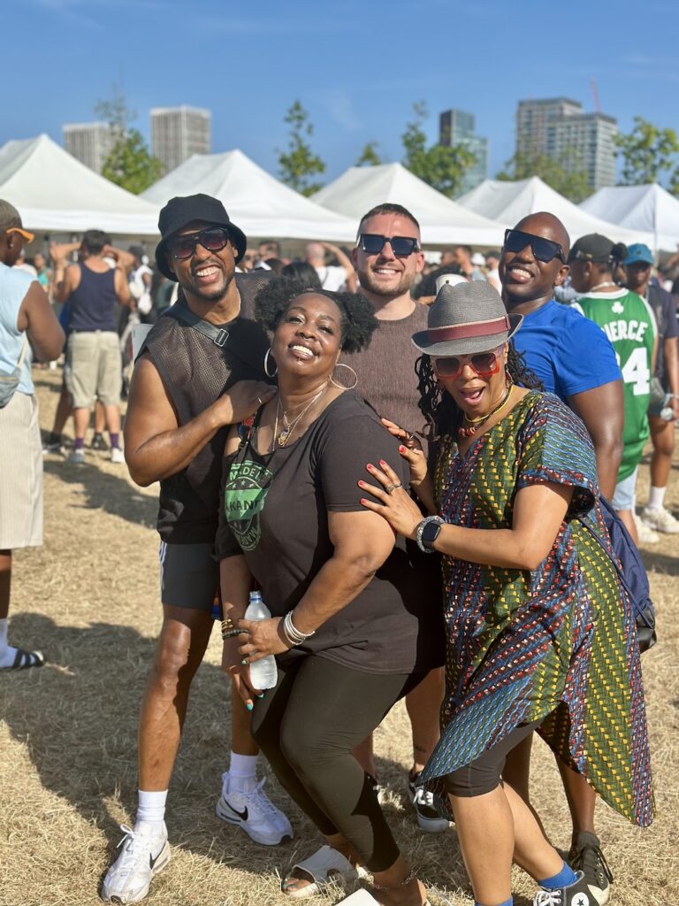 five UK Black Pride attendees pose for a photo