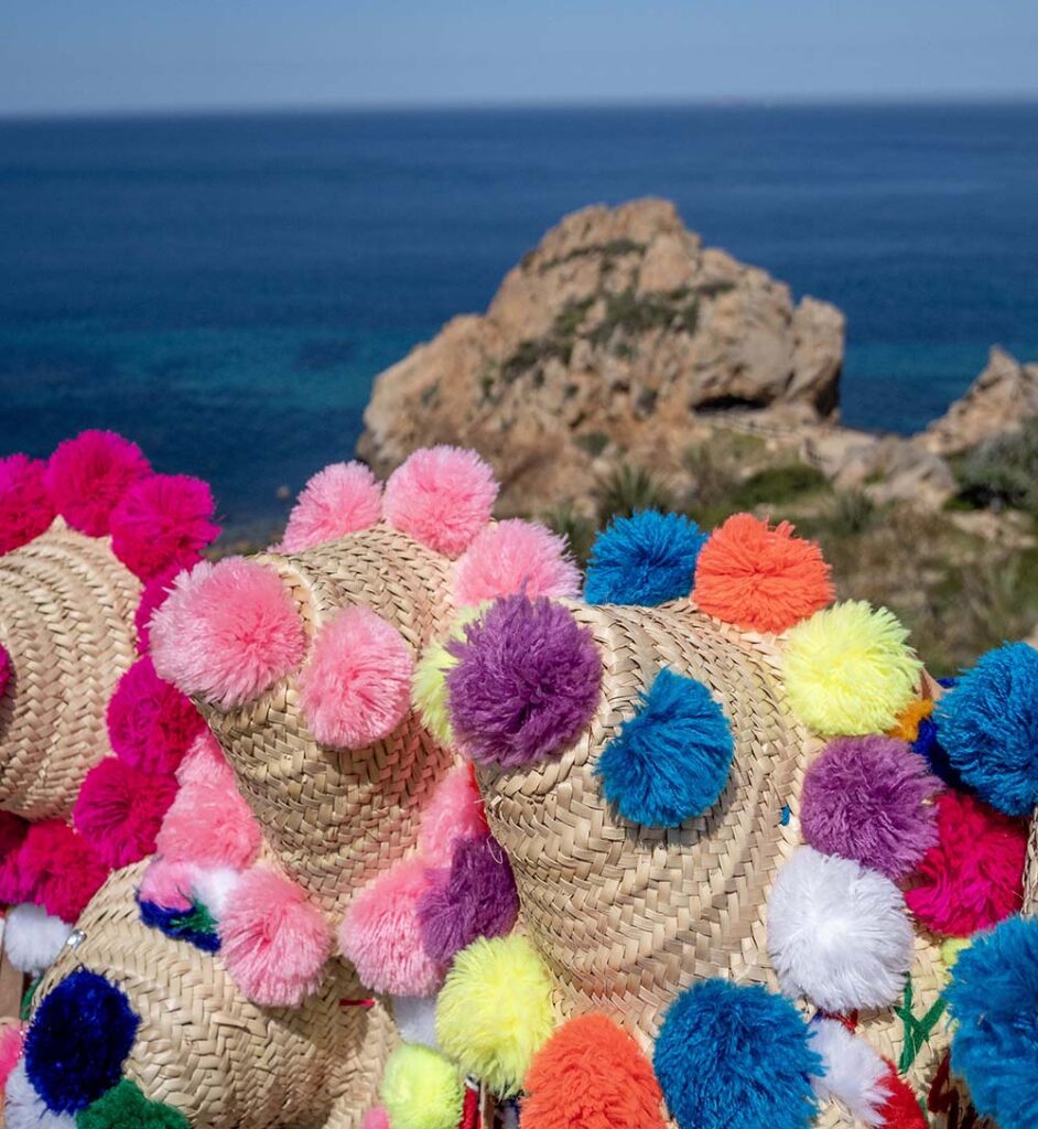 chachiya jebaliya, the locals’ traditional straw hats adorned with colourful pompoms