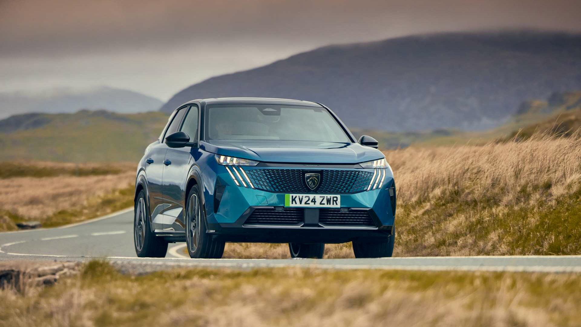 PEUGEOT E-3008 driving on a road