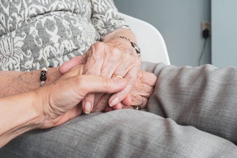 An elderly couple holding hands LGBTQ+