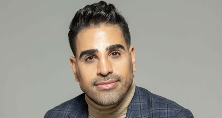 A landscape-shaped headshot of Dr Ranj