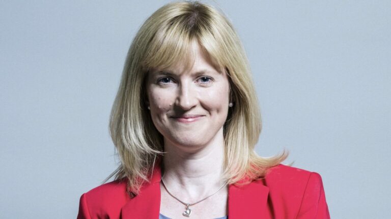 A picture of Rosie Duffield wearing a red jacket