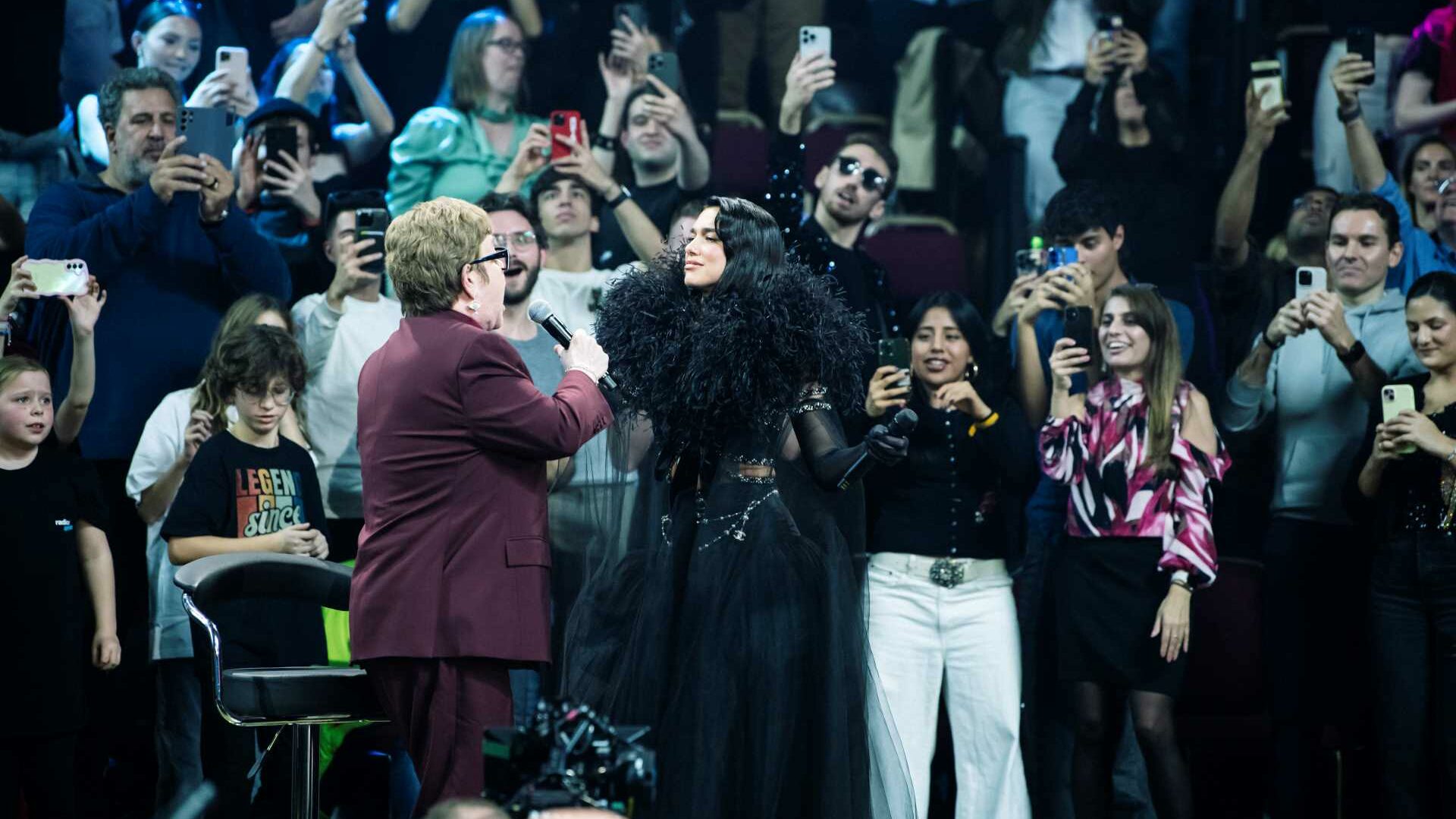 Elton John and Dua Lipa on stage at the Royal Albert Hall