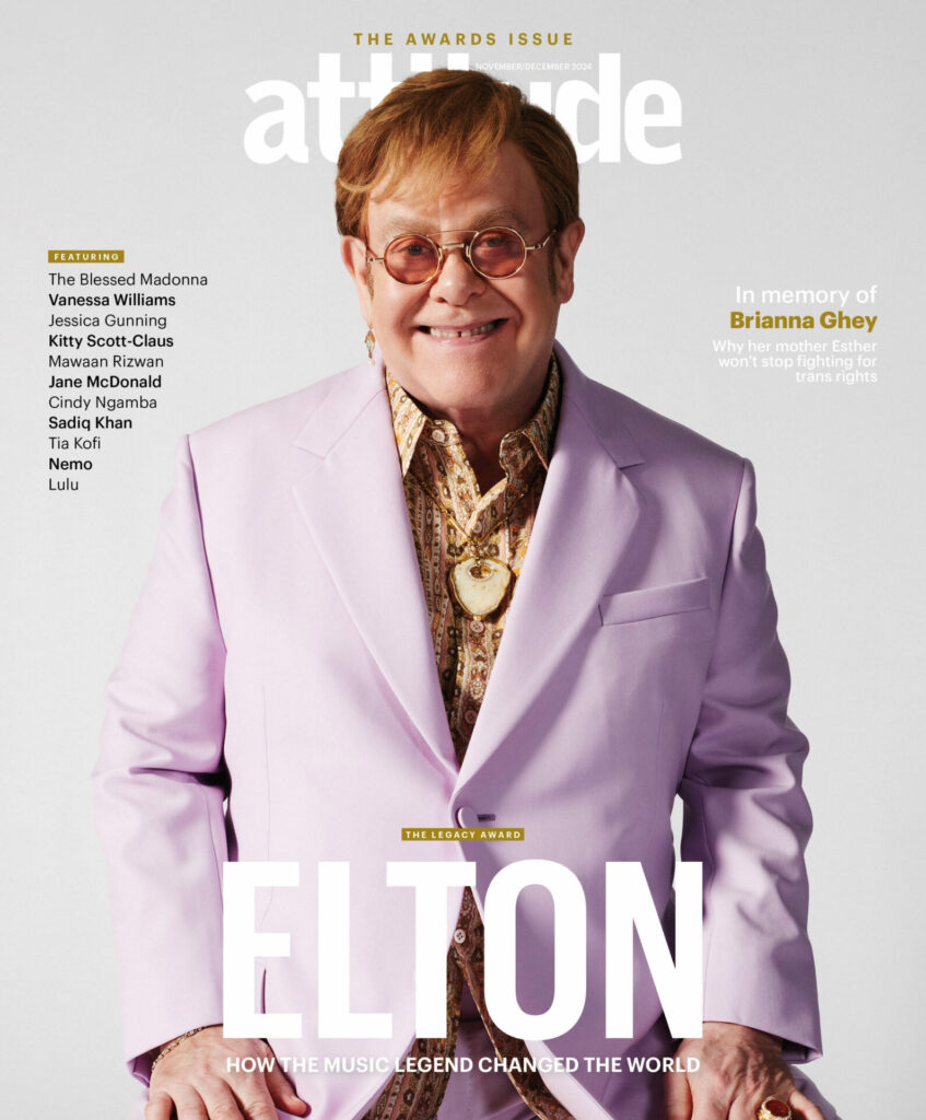 Elton John on the cover of Attitude magazine wearing a purple suit