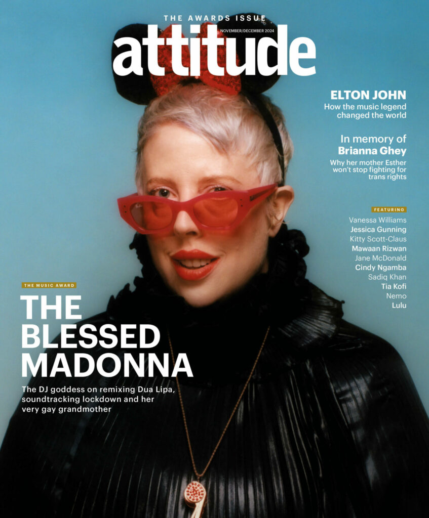 The Blessed Madonna wearing red glasses and Minnie Mouse ears, on the cover of Attitude Magazine