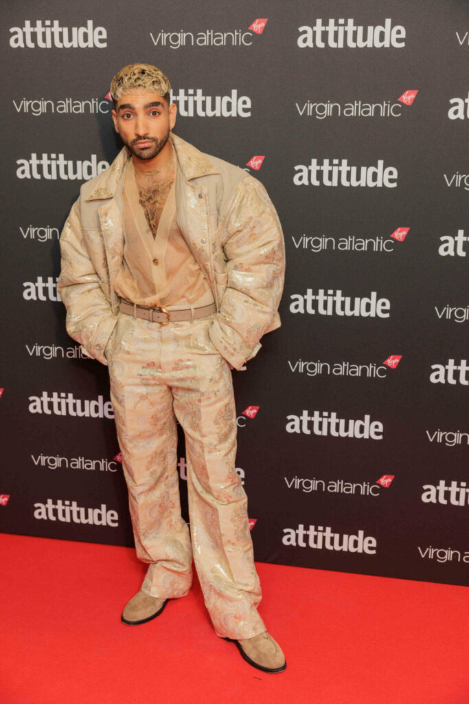 Mawaan Rizwan in a sand-coloured suit