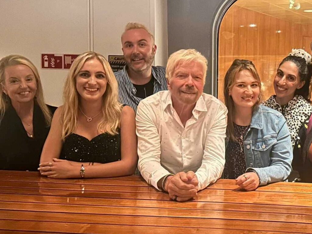 A group of people with Richard Branson