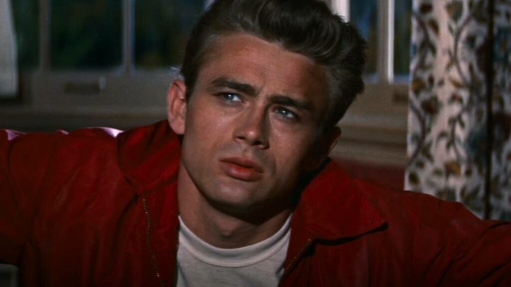 James Dean wearing a red jacket