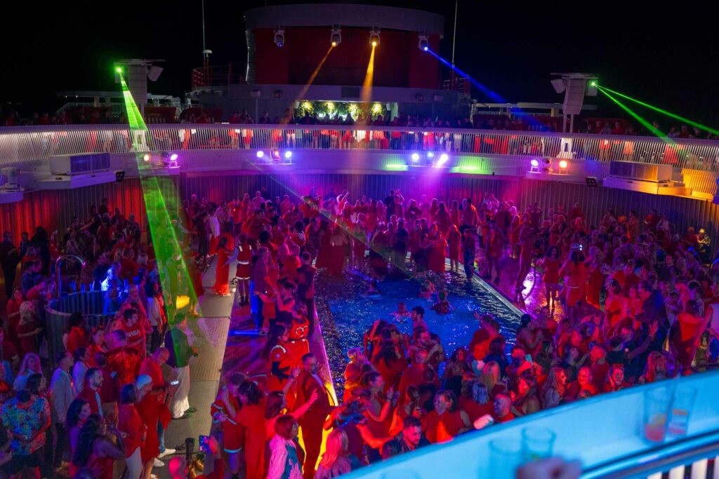 Crowd of people partying on a cruise ship