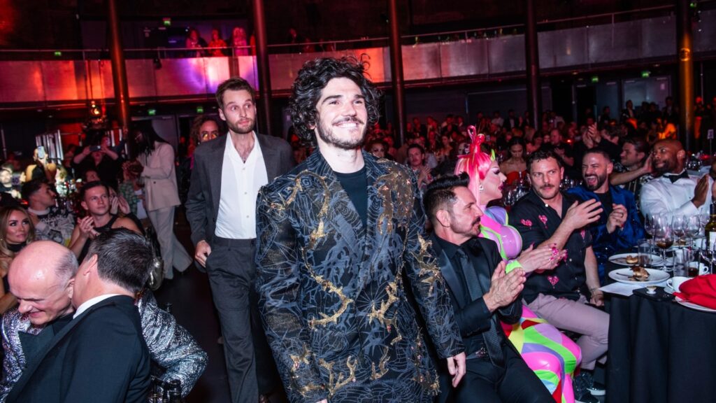 Sion Daniel Young and Fra Fee on their way to accept the TV Award for Lost Boys and Fairies (Image: Attitude/Kit Oates)