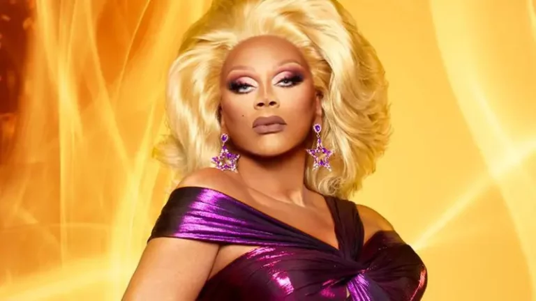 RuPaul in a purple dress