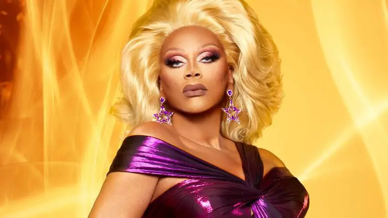 RuPaul in a purple dress