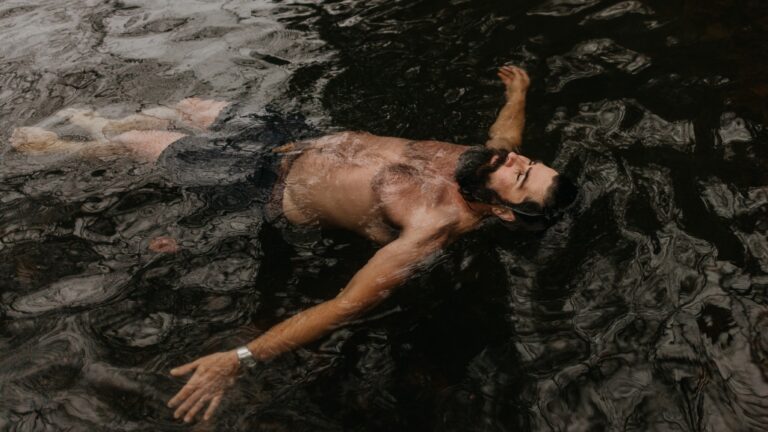 a man bathing in a pool