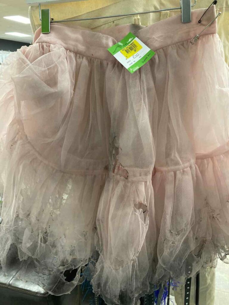 A pink tutu on a rack