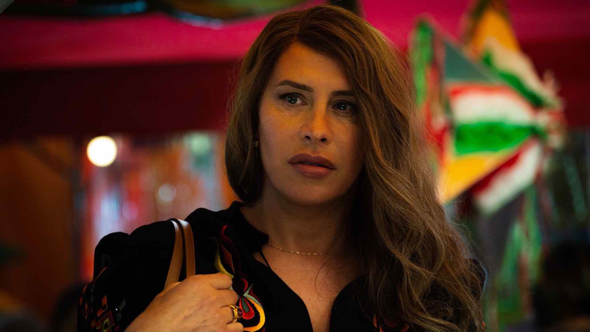 Karla Sofía Gascón in a still from Emilia Pérez, head and shoulders (Image: Netflix)