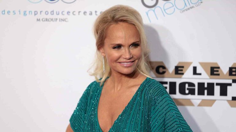 Kristen Chenoweth in a blue dress.