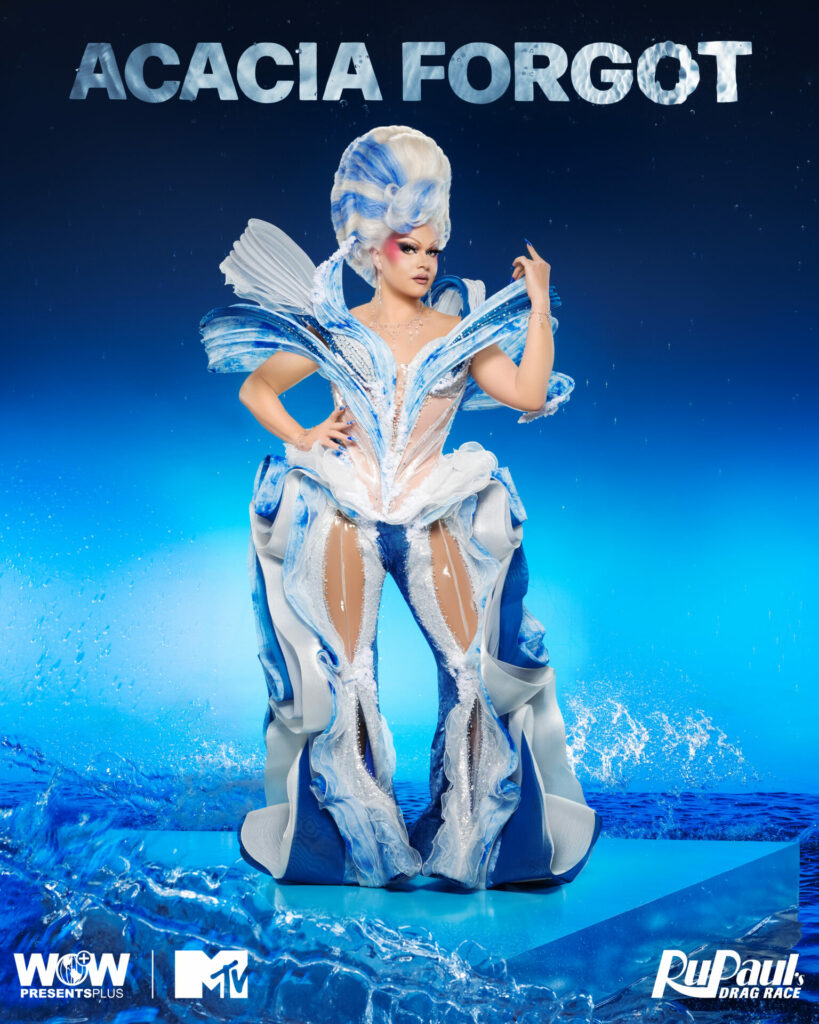 A drag queen against a water-themed blue backdrop