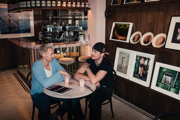 two people sitting having a coffee at Boys