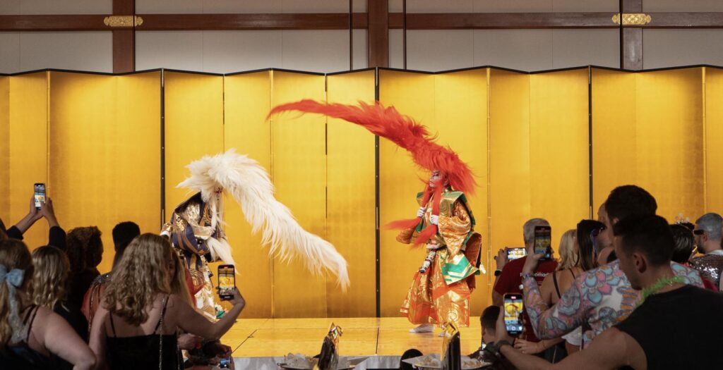 Kabuki dancers performing the Renjishi dance with metre-long wig flicks