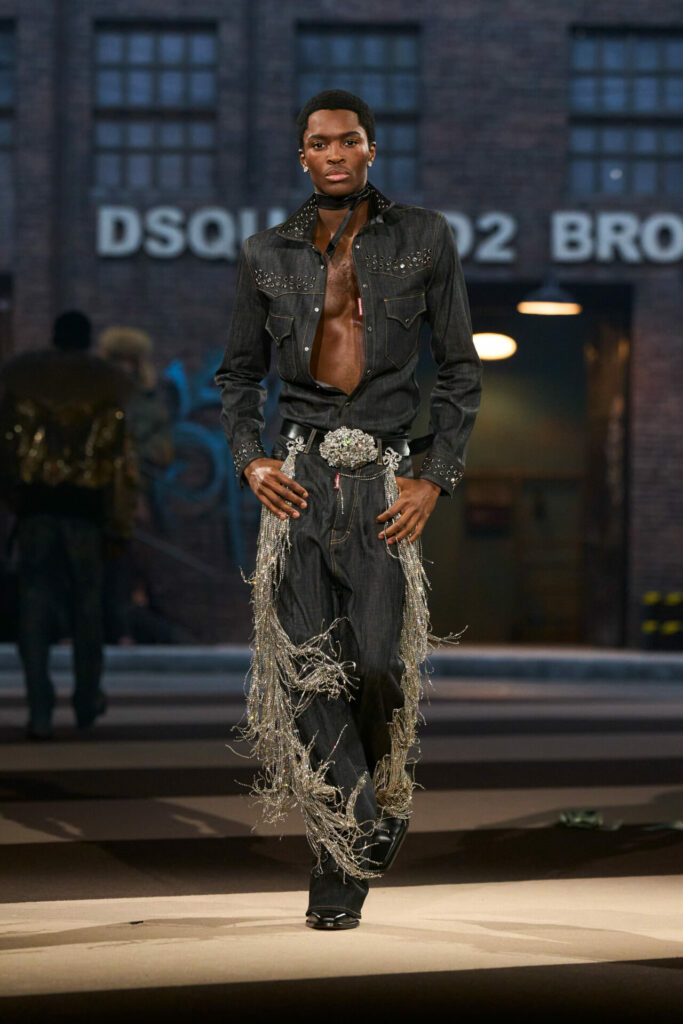 Alton Mason walks the runway in double denim look, silver fringe details on jeans