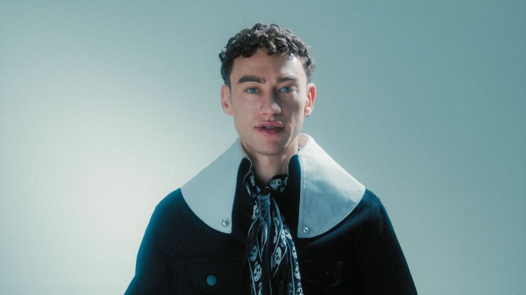 A head and shoulders shot of Olly Alexander