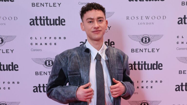 Olly Alexander head and shoulders - in white shirt and black tie