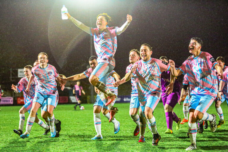 The players of TRUK celebrate on the pitch