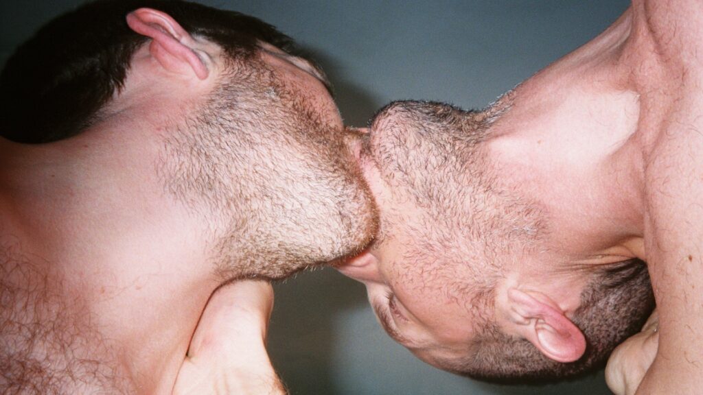 two men kissing